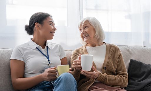 Adult social care worker with an older woman